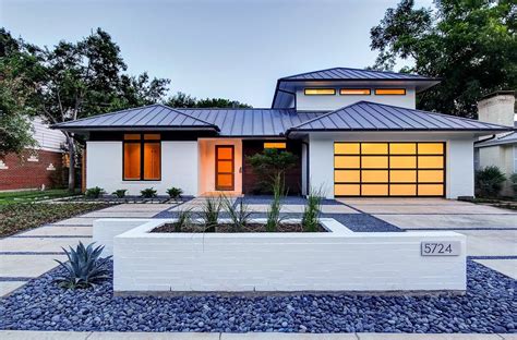 mediterranean style house with metal seam roof|Elevator.